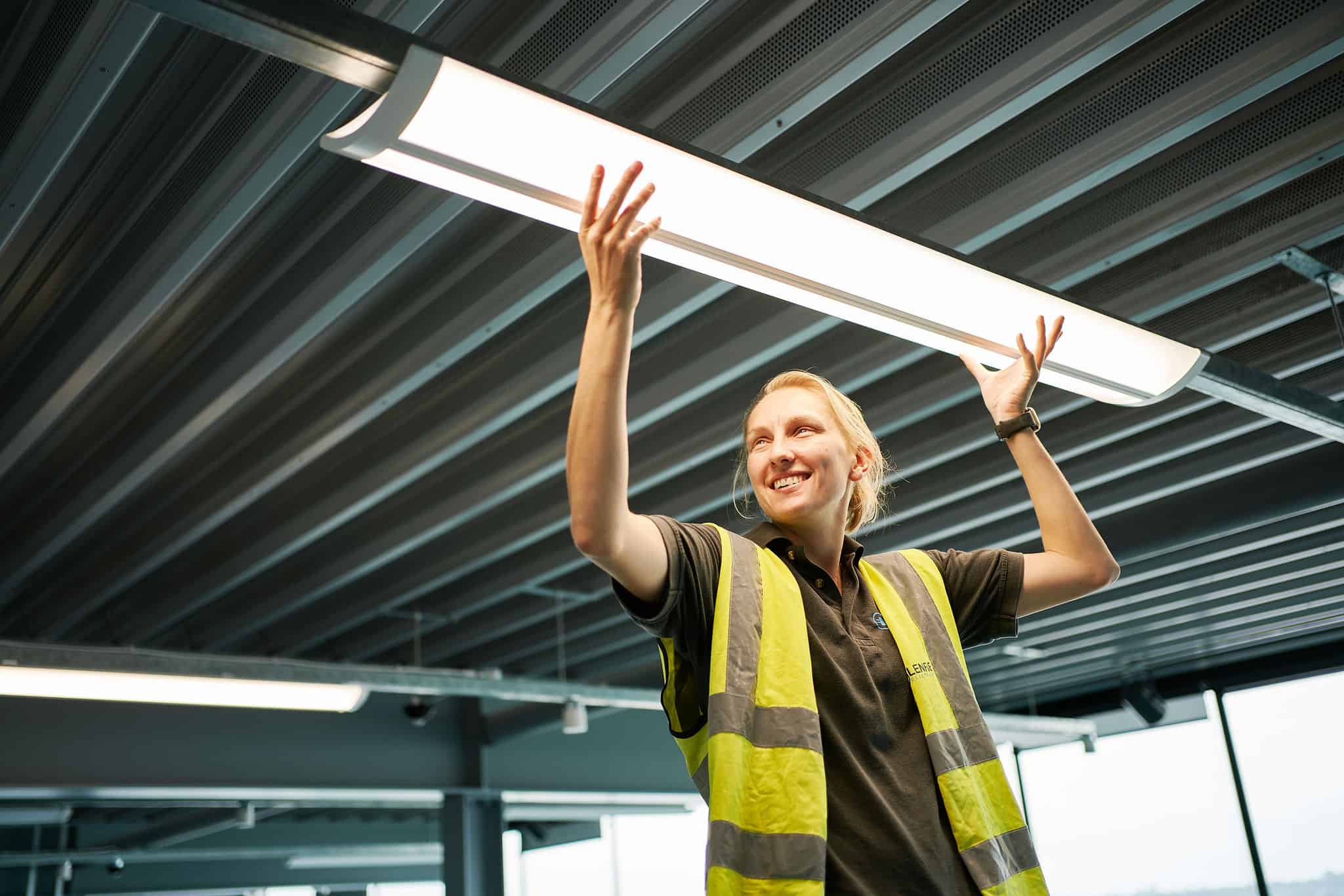 Amy installing an LED light